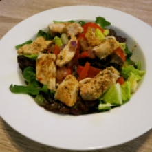 Mixed greens and spinach with grilled chicken, red peppers, and red onion. Topped with Annie's Chile Lime dressing.