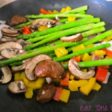 Sautéed asparagus, mushrooms, red and yellow peppers, and onion
